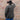 View of Schaefer oak waxed canvas High Plains Drifter jacket with leather collar and multiple pockets