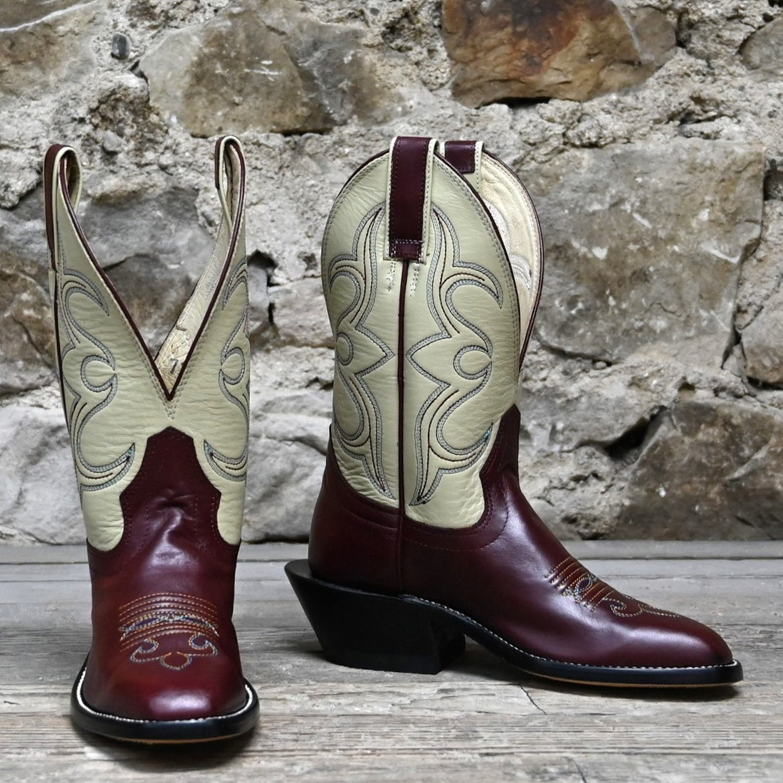 View of Atomic 79 exclusive Hondo Bronc Boot with bone top, burgundy vamp, French square toe, and spur lip