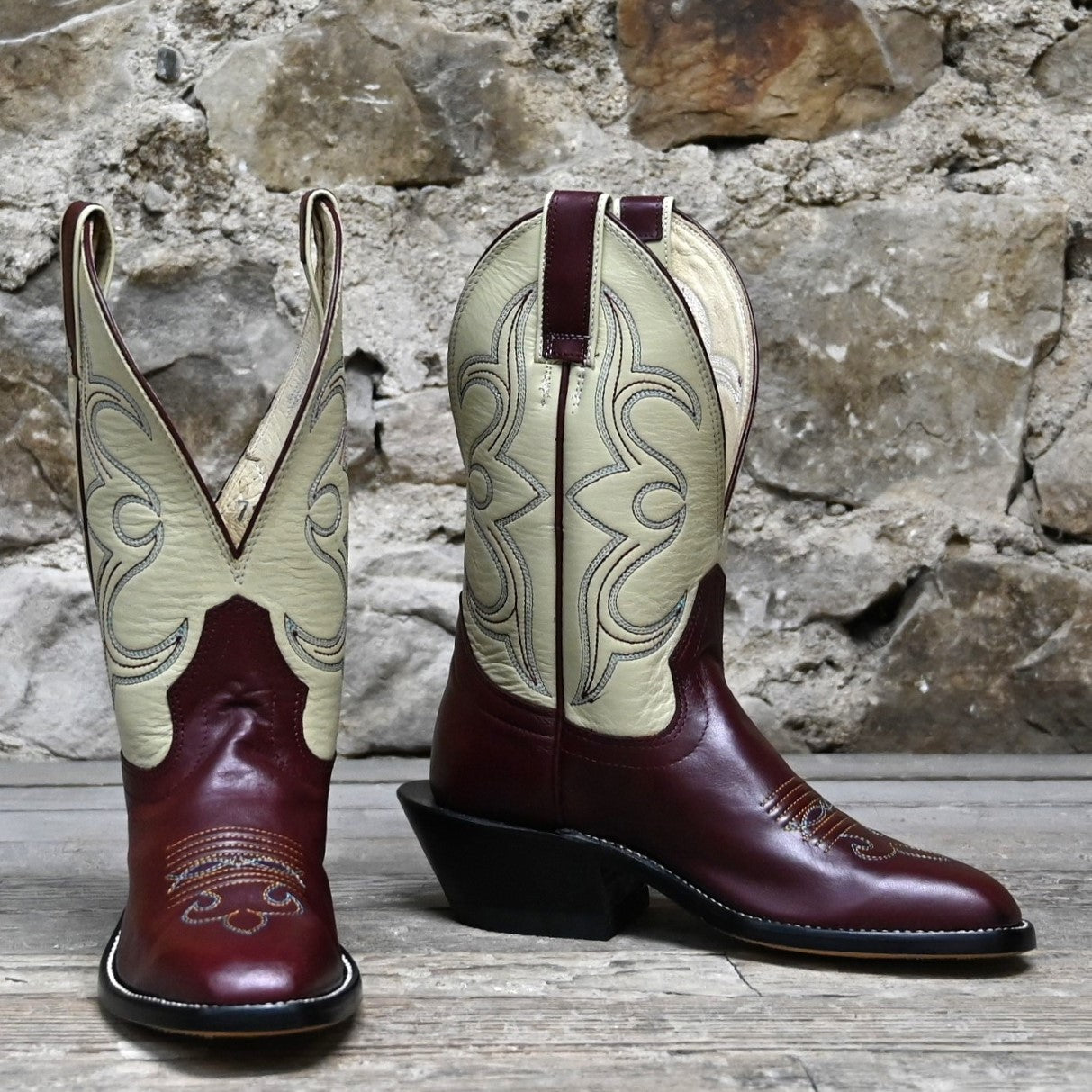 View of Atomic 79 exclusive Hondo Bronc Boot with bone top, burgundy vamp, French square toe, and spur lip