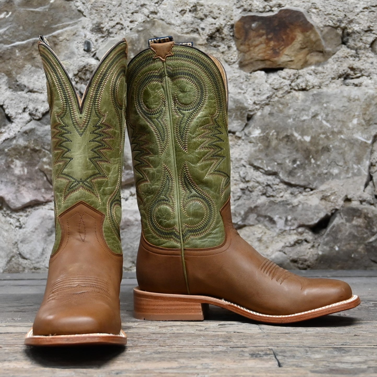 View of Hyer CODELL OLIVE 13&quot; boots showcasing Olive Bravo Goat leather upper and Clay Oilbuck Cowhide vamp with broad square toe and Stockman block heel