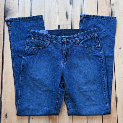 View of Wrangler Ultimate Riding Jean – Cash Fit in American Spirit wash with boot cut leg