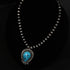 View of Sunwest Silver Oxidized Bead Necklace with Morenci Turquoise featuring oxidized silver beads and vibrant Morenci turquoise stone
