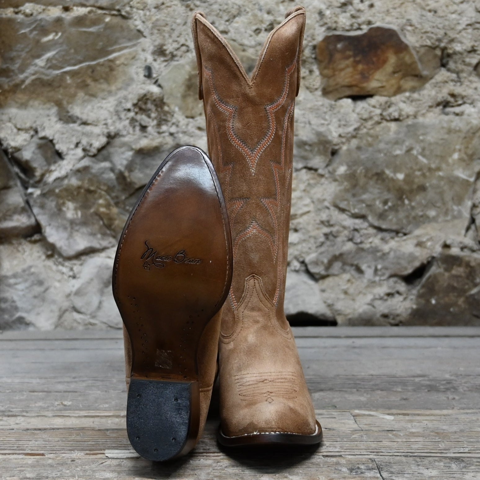 View of Macie Bean 15″ “Mind Your Own Biscuits” tobacco suede boot with almond toe and decorative stitch