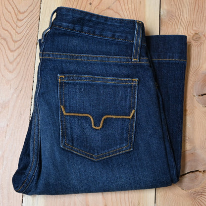 View of Kimes Ranch Jennifer Jeans in Dark Wash, featuring an ultra-high rise and super wide flare leg with hand-sanding and whisker details