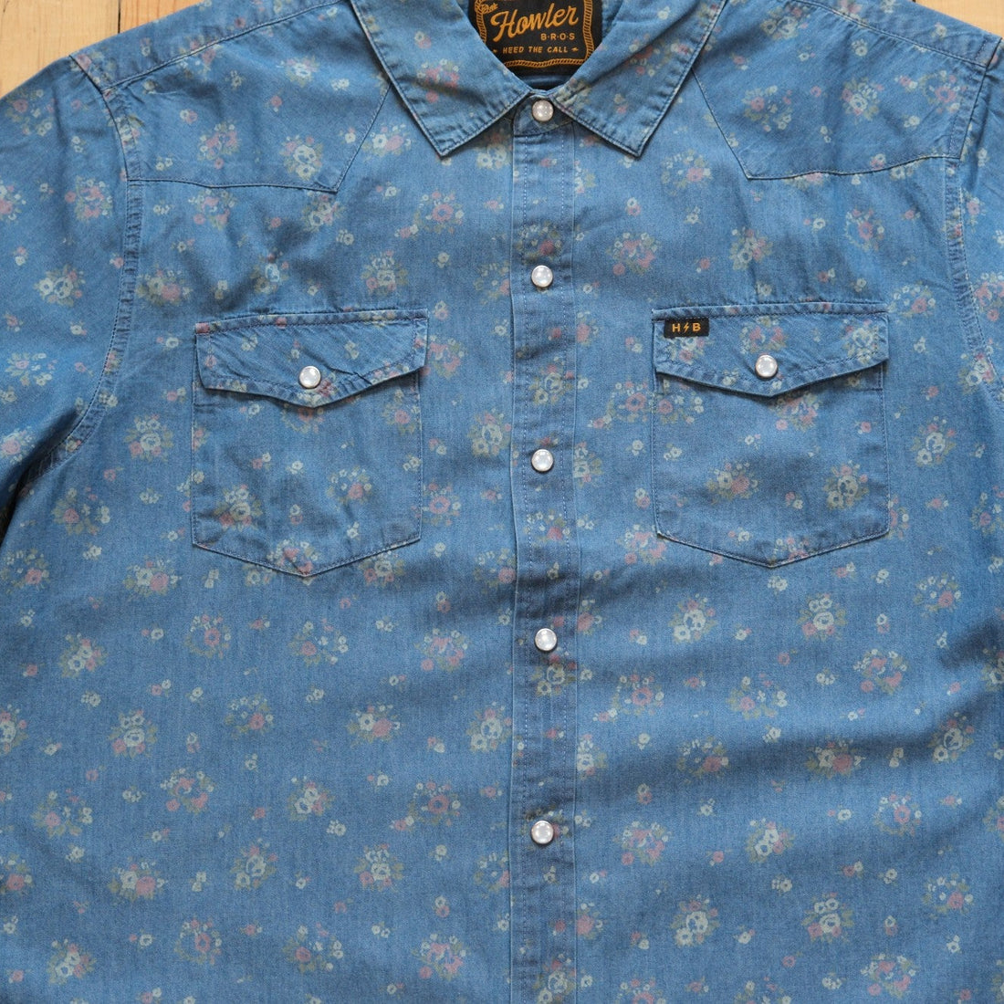 Howler Bros H-Bar-B Snapshirt in Bouquets Washed Indigo with floral print.