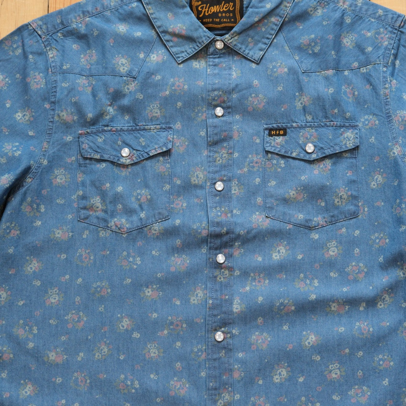 Howler Bros H-Bar-B Snapshirt in Bouquets Washed Indigo with floral print.
