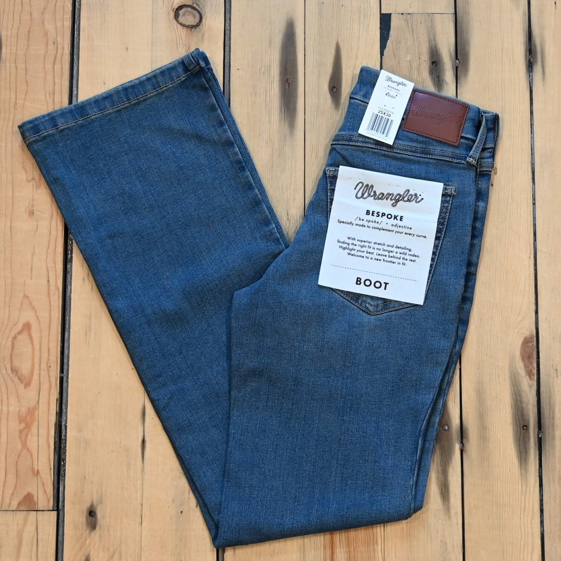 View of Wrangler Ladies boot cut jeans in Ada wash with high-rise fit from the Bespoke Collection