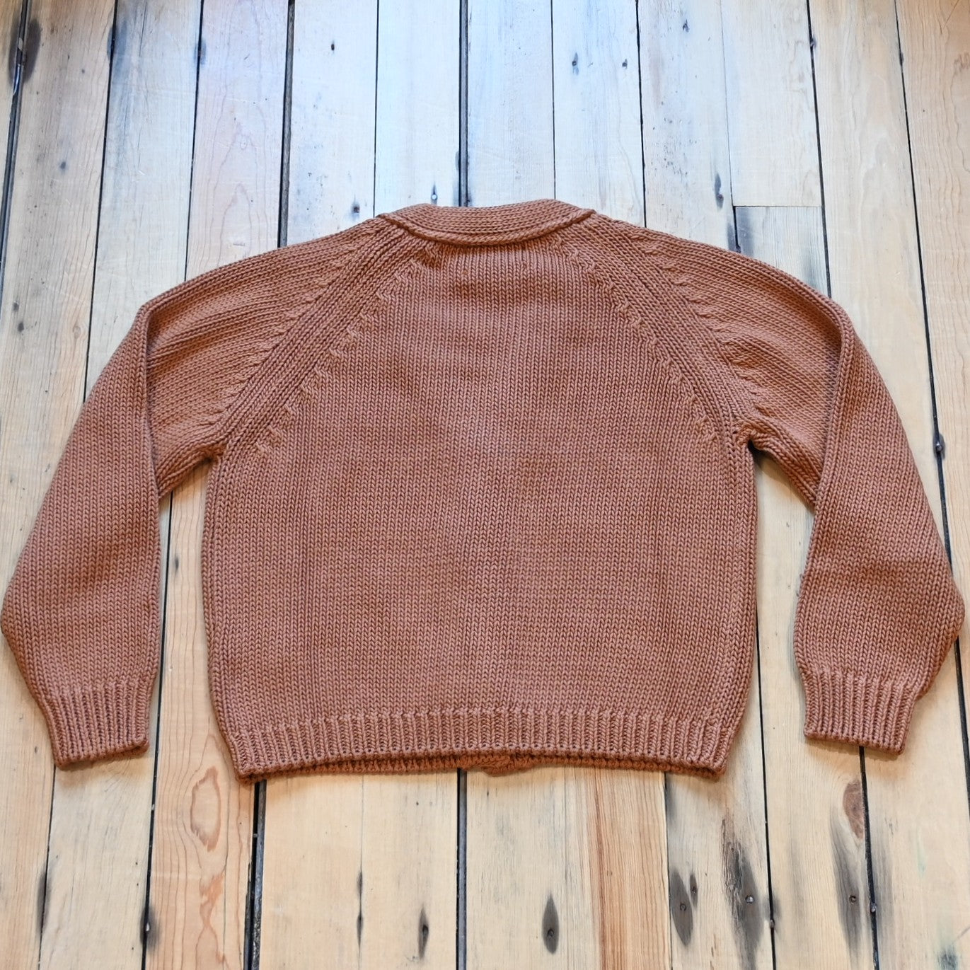 View of Filson Ladies Rustic Cotton Cardigan in Chestnut featuring a V-neckline and four-button front closure