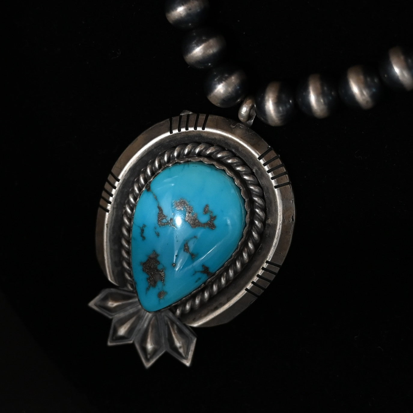 View of Sunwest Silver Oxidized Bead Necklace with Morenci Turquoise featuring oxidized silver beads and vibrant Morenci turquoise stone