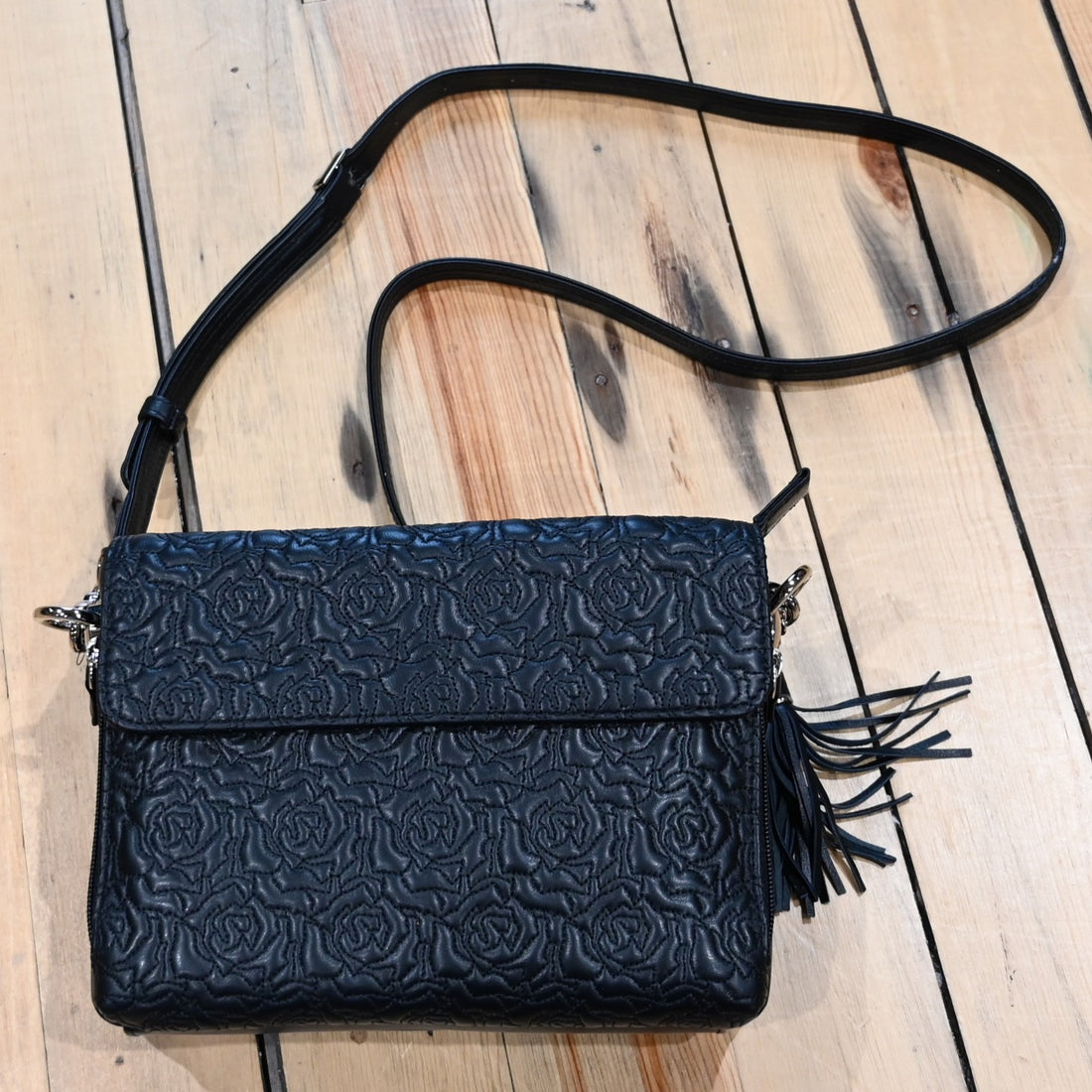 Gun Toten Mamas black embroidered lambskin clutch with rose design and conceal carry features