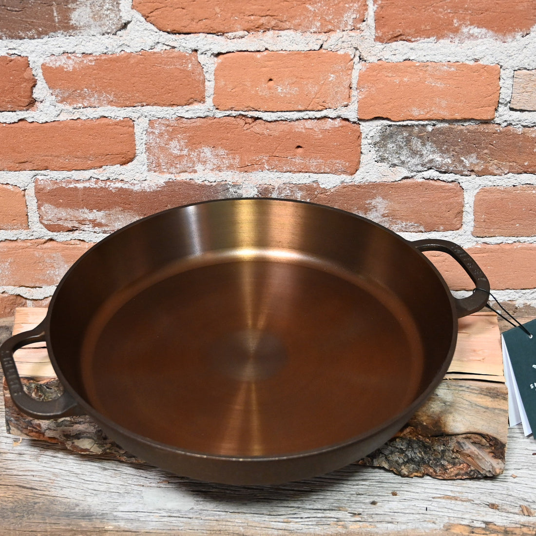 View of Smithey No. 14 Dual Handle Cast Iron Skillet with polished interior and dual ergonomic handles