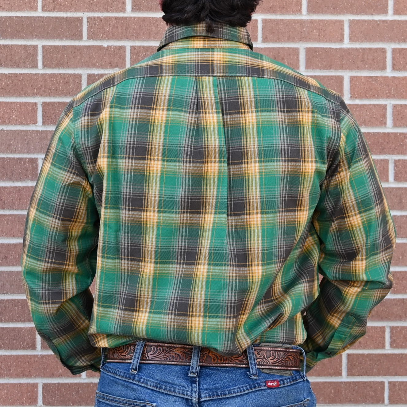 View of Filson Lightweight Alaskan Guide Shirt in Yellow/Green/Gray Plaid featuring gusseted chest pockets and relaxed fit