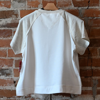 View of Kimes Ranch Hellena Cropped Henley Shirt in Pristine, featuring a cropped fit and button-front placket