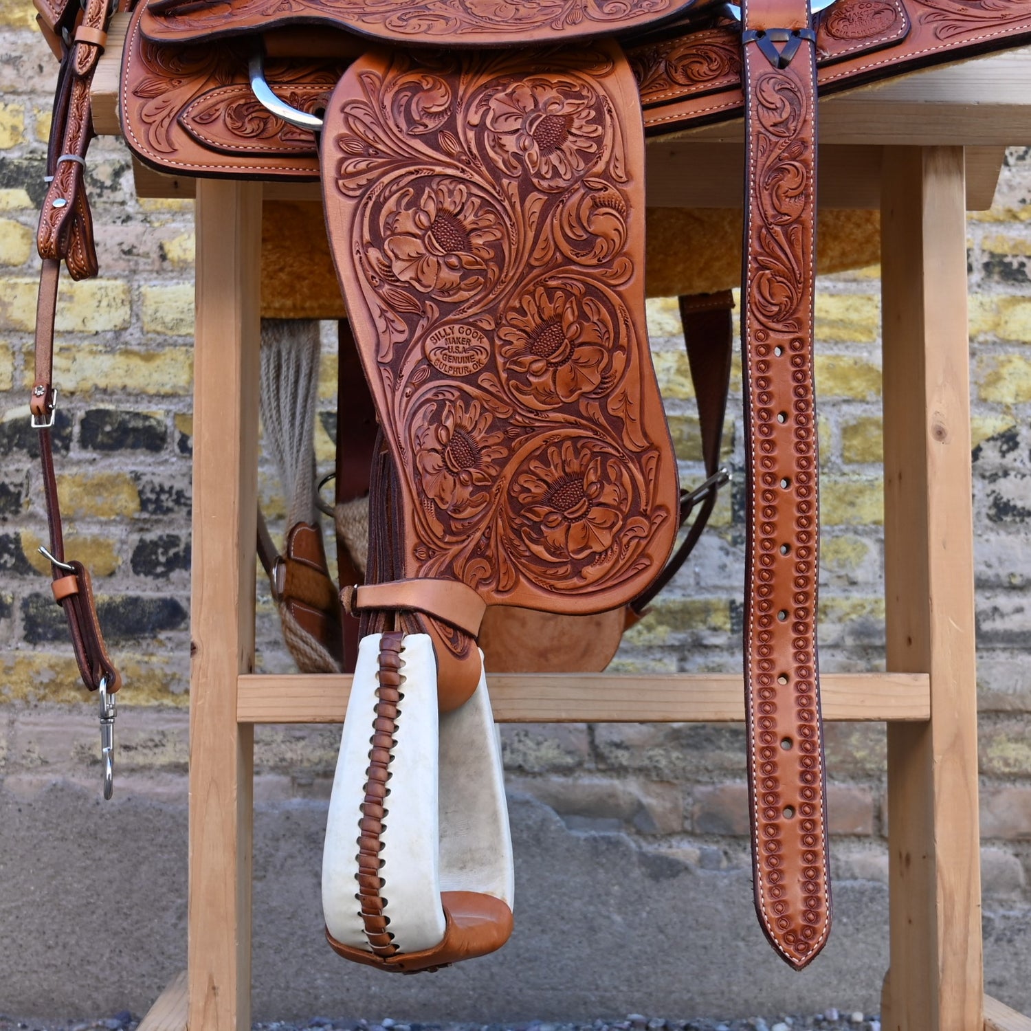 View of Billy Cook Fully Tooled Roper Saddle with Bridle, Breast Collar, and Reins