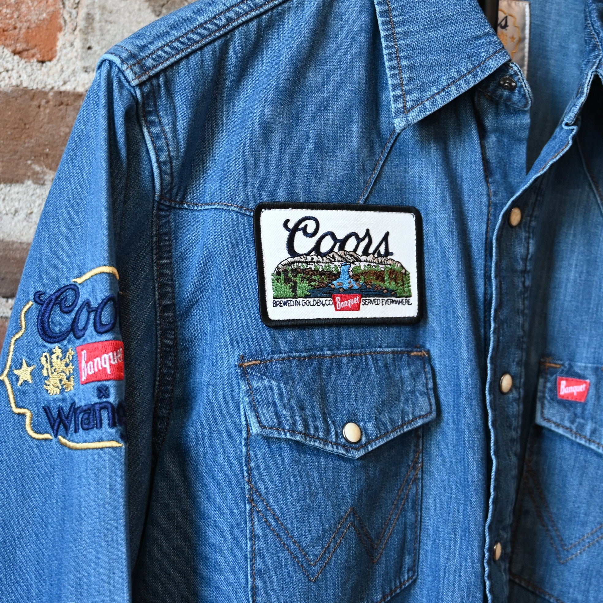 Wrangler × Coors Golden Blue denim shirt with western yoke and snap details