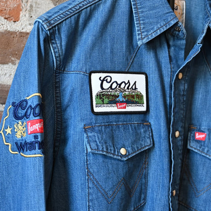 Wrangler × Coors Golden Blue denim shirt with western yoke and snap details