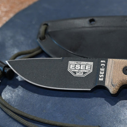 ESEE-3P-CP MIL knife with black blade, micarta handles, glass breaker pommel, and OD MOLLE sheath