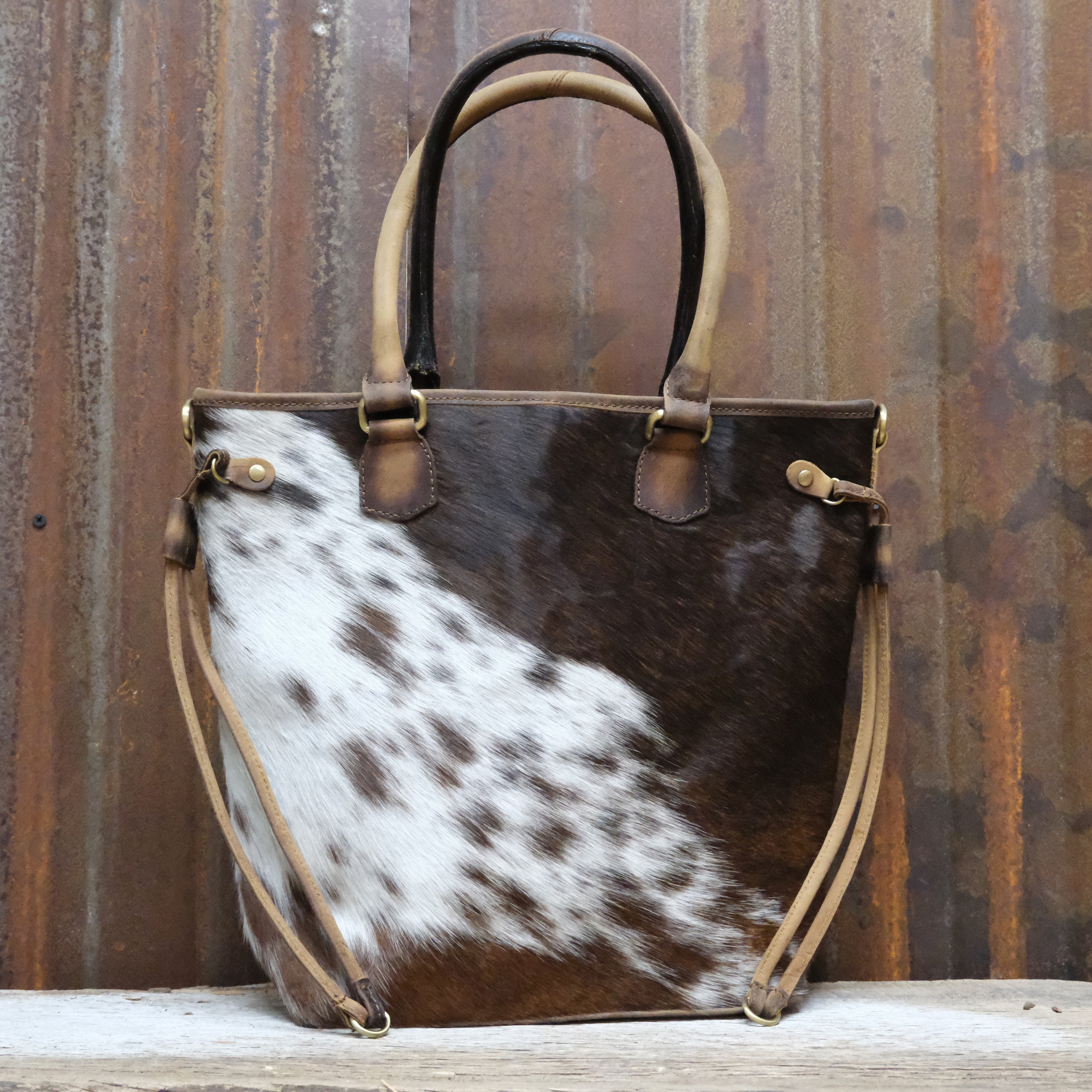 American Darling hair on brown and white conceal carry tote bag with canvas back and leather straps