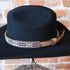 Adjustable Sambboho beaded hatband on a western felt hat at Atomic 79.
