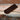 View of Smithey Ironware Leather Skillet Sleeve – Standard, crafted from oil-tanned leather to protect your hands from hot skillet handles