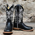 View of Macie Bean Kids Black Eyed Susan boot with black leather and white floral stitching