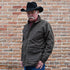 View of Schaefer oak waxed canvas High Plains Drifter jacket with leather collar and multiple pockets