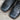 View of Hondo 11" cowboy boot with bone leather top, black steer vamp, and wide square toe