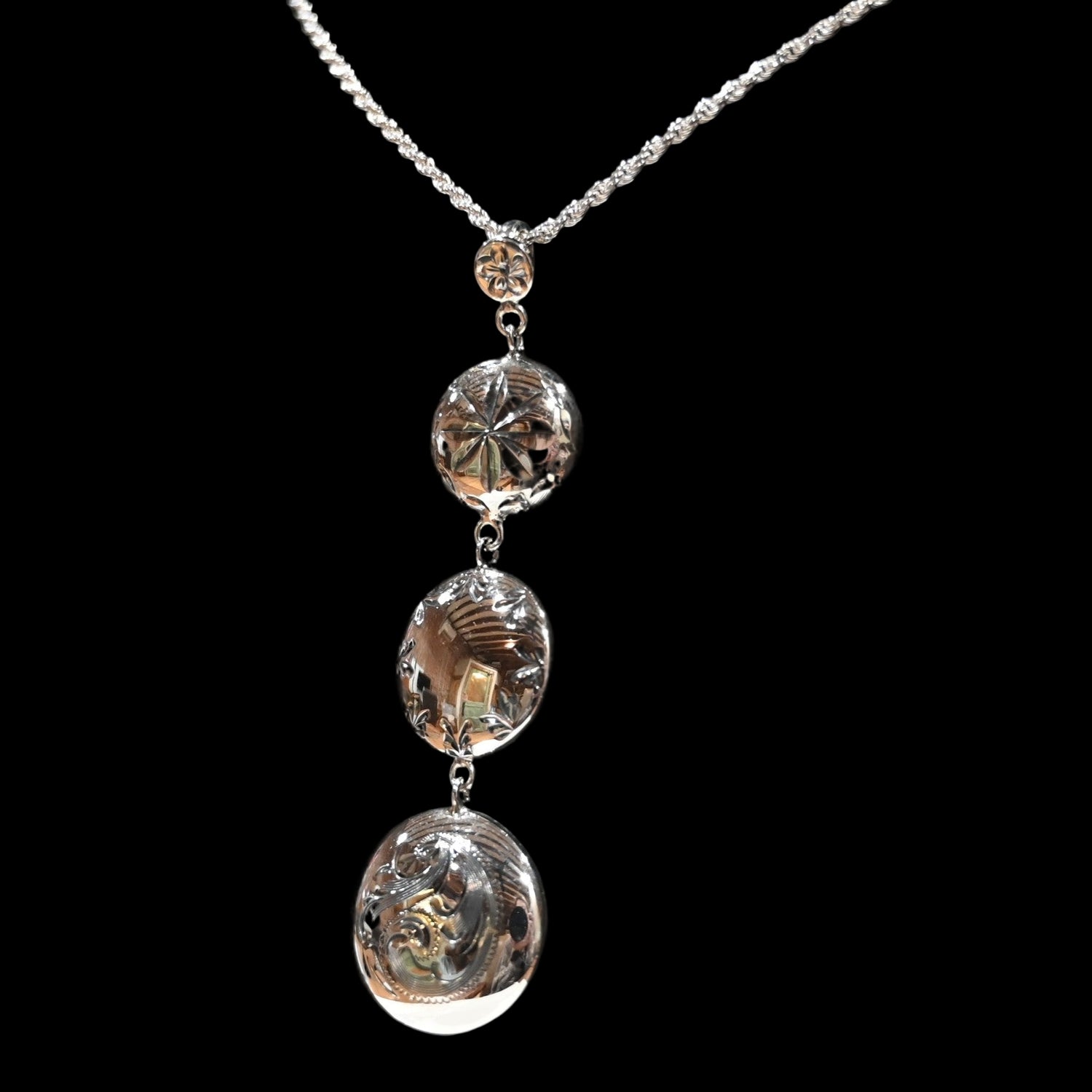 Vogt Silversmiths Kimberly Going Out pendant, sterling silver with three engraved conchos