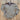 View of Rockmount men’s khaki Western shirt with floral embroidery and classic yoke styling