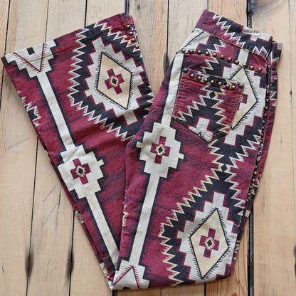 View of Double D Ranch Left Behind Pants – Traditional rug pattern with brass accents for a Western-inspired design