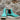 View of Macie Bean ladies turquoise suede wedge bootie with cutter toe and white swedge sole