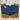 Filson × Wrangler Two-Tone Adventure Jean in indigo with tan waxed canvas reinforcements