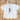 Ladies vintage white Boot Scootin’ boxy tee by Sendero with cowgirl roping graphic and cropped fit