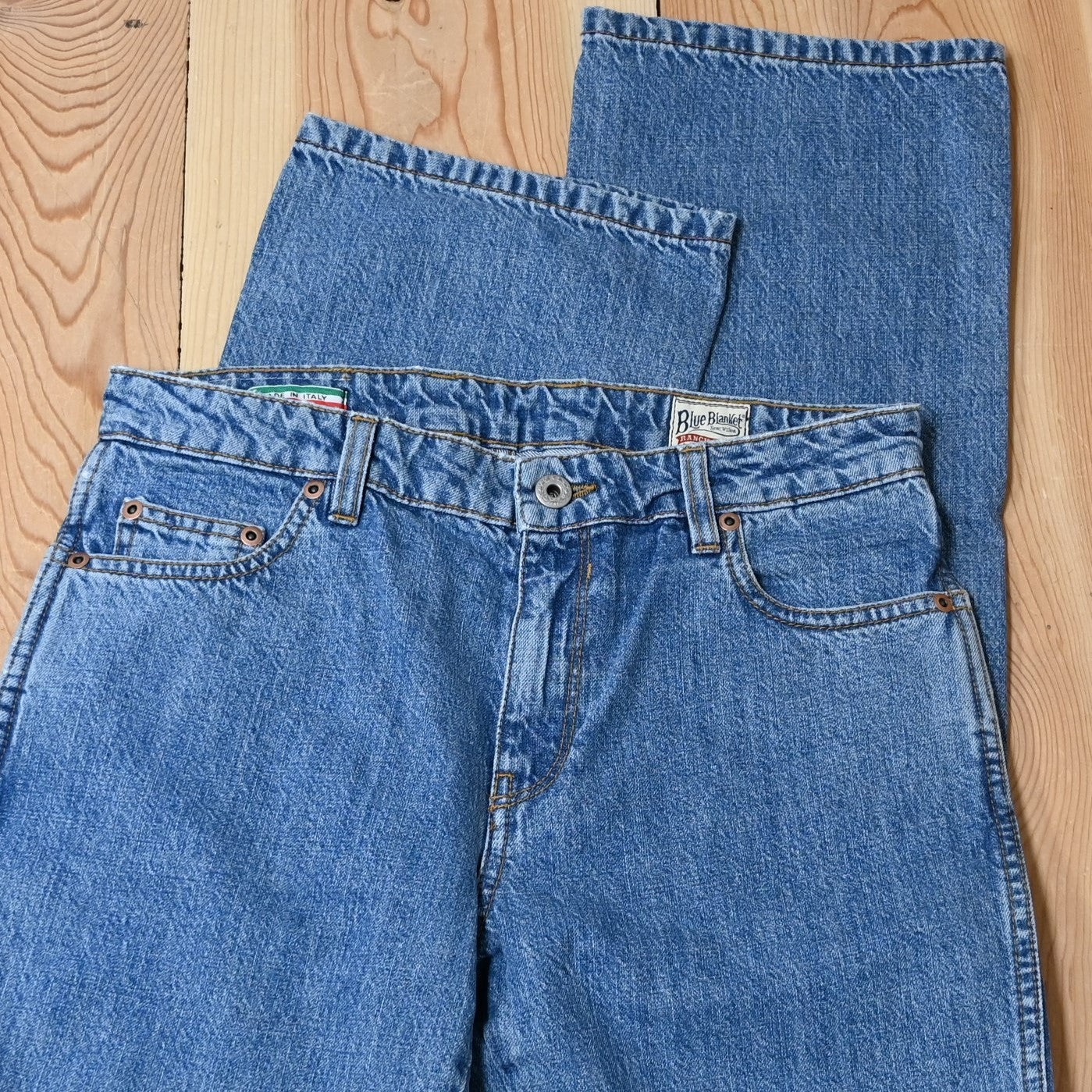 View of Blue Blanket ladies light indigo denim jeans with straight-leg silhouette and tailored waist