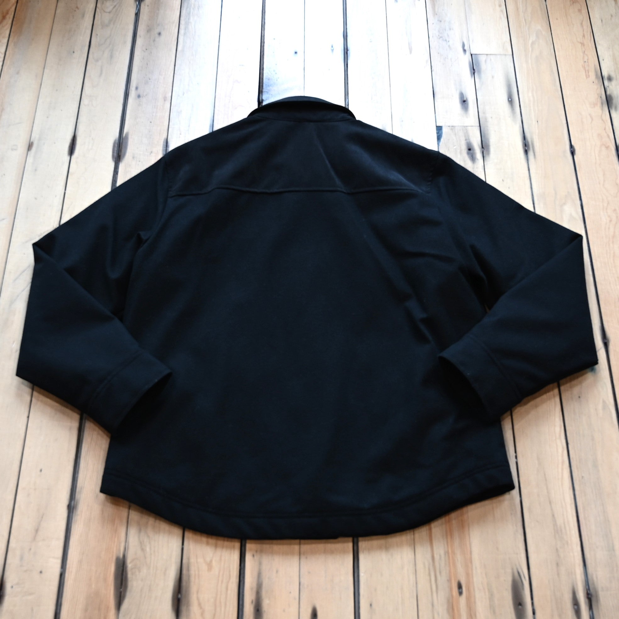 View of Pendleton Men’s Timberline shirt jacket in black wool blend with quilted lining and corduroy shoulder detail