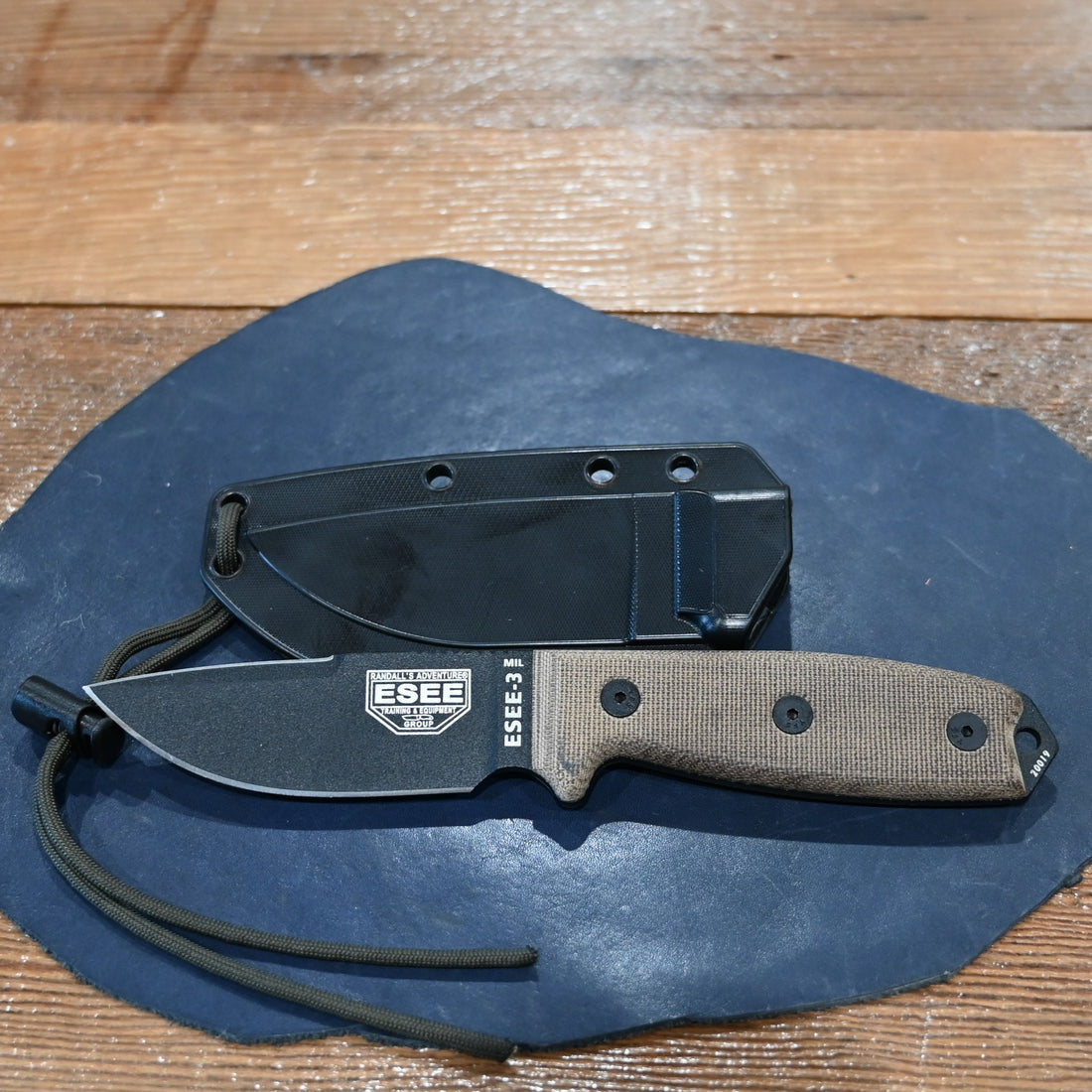 ESEE-3P-CP MIL knife with black blade, micarta handles, glass breaker pommel, and OD MOLLE sheath