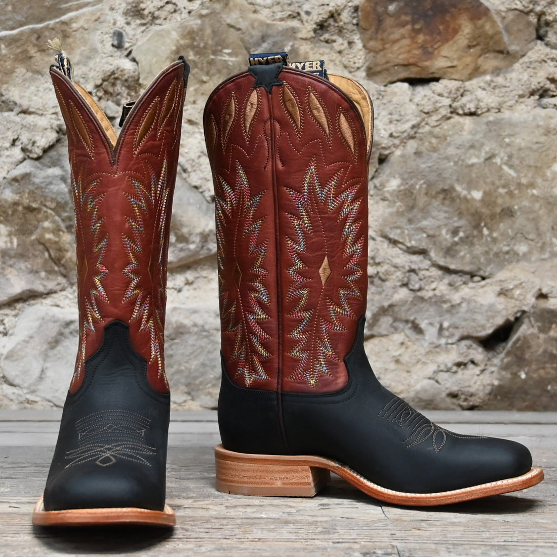 View of Hyer CHERRYVALE 13" boots showcasing cognac Garrison goat leather upper and black mule cowhide vamp with broad square toe and Stockman block heel