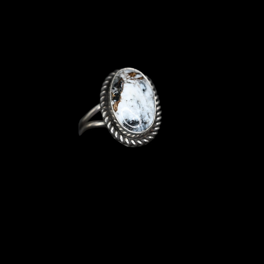 Sunwest Silver White Buffalo Turquoise Ring with rope border in sterling silver, featuring bold black-and-white veined stone, size 8