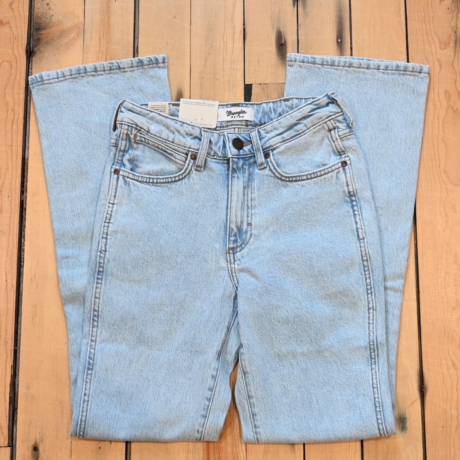 View of Wrangler Ladies Retro Bailey boot cut jeans in Lila wash with slim fit and high-rise waist
