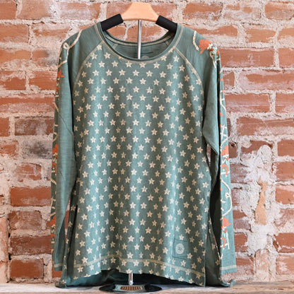 View of Double D Ranch Cowboys Up My Sleeve Top – Button-down top in Garcitas Green with cowboy-inspired print and a relaxed, flattering fit