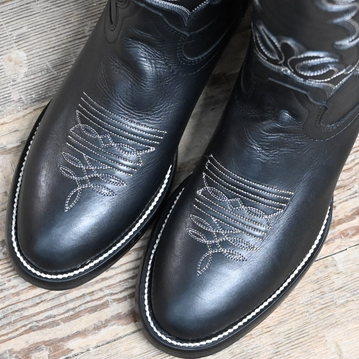 View of Hondo 16&quot; cowboy boot with black retan vamp, natural lined top, flourished stitching, and spur ledge