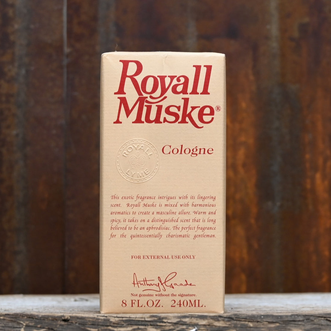 Royall Muske 8 oz bottle of all-purpose lotion and splash cologne in classic tan glass with gold cap