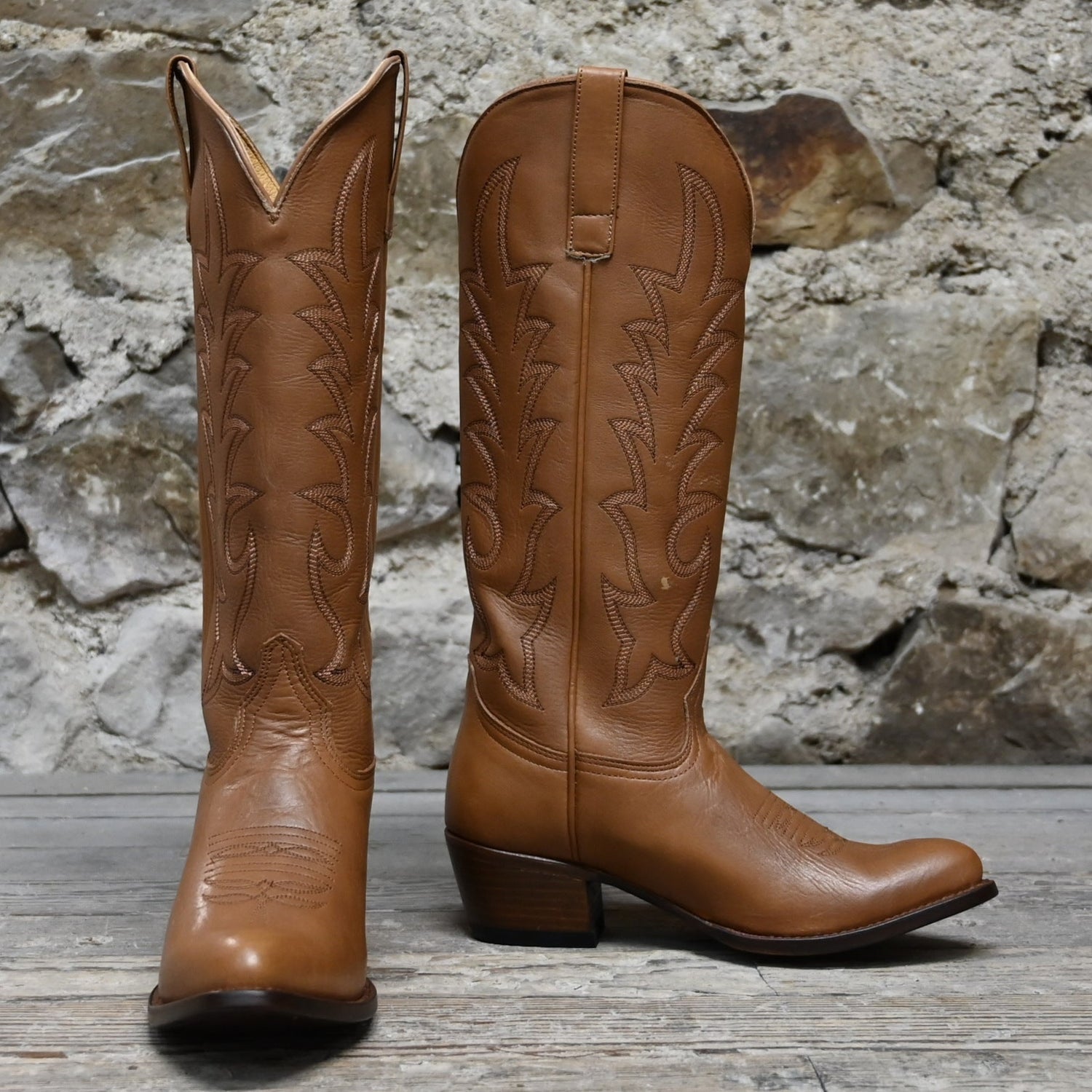View of Macie Bean 15″ “Elle On Wheels” boot in tan Telluride leather with almond toe and City Girl heel