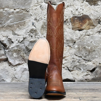 View of Front and Sole of Olathe 17&quot; Brown Leather with Black and Yellow Toe Bug.