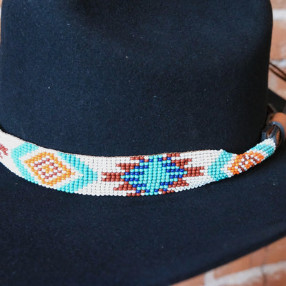 Sambboho Aztec beaded leather hatband with vibrant red, white, and turquoise native geometric patterns.