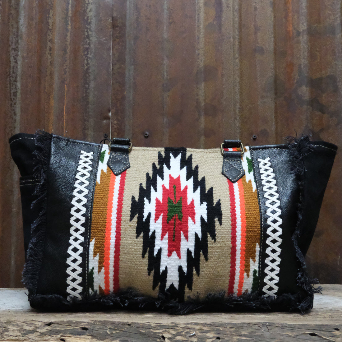 Myra Tulsa Rosa small woven bag in coal with leather trim and patterned design