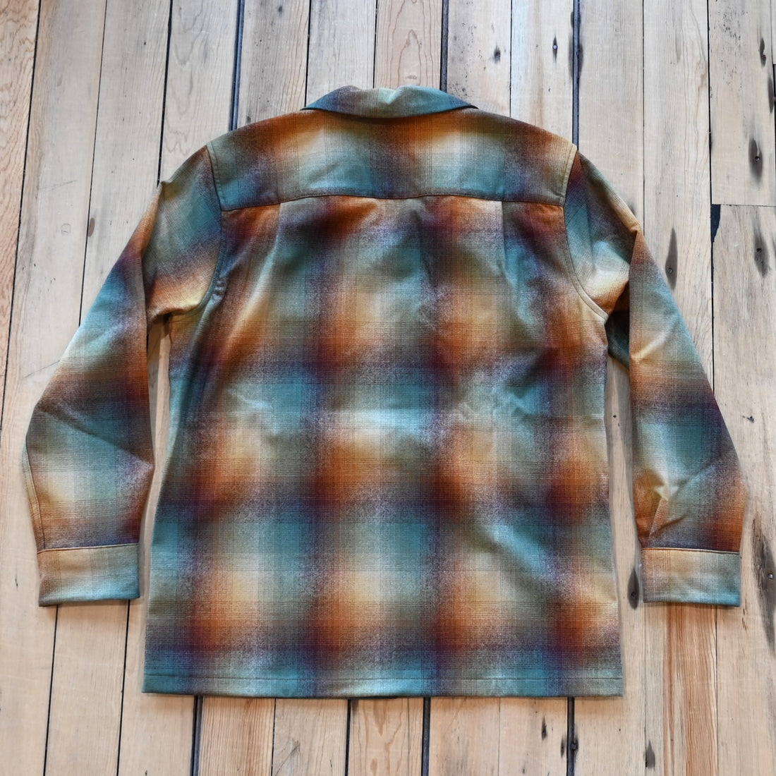 View of Pendleton boyfriend board shirt in gold‑to‑green ombre virgin wool with chest pockets