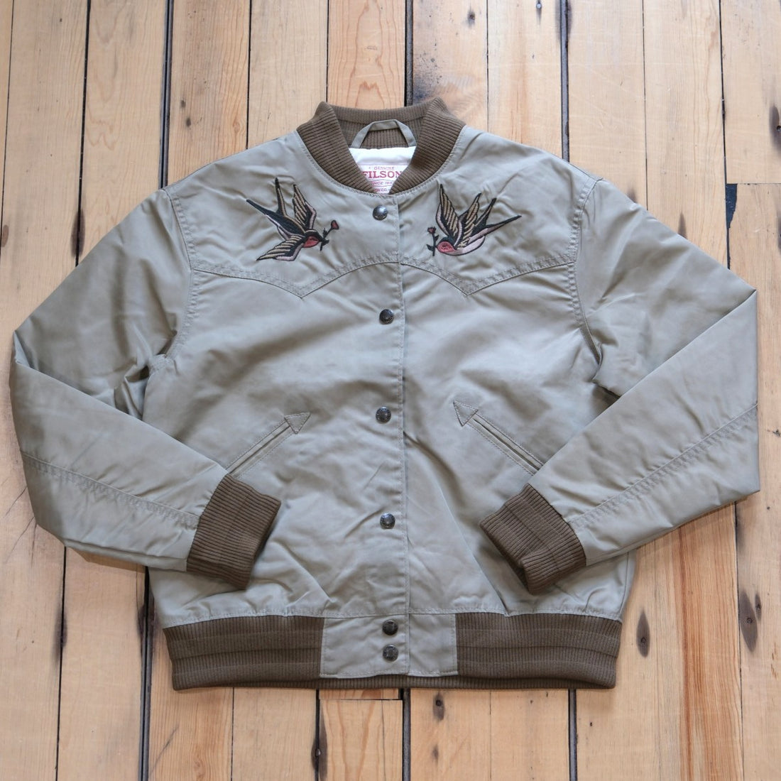Filson Ladies Western Satin Jacket in Silver Sage featuring embroidered western yokes and a snap-front design.