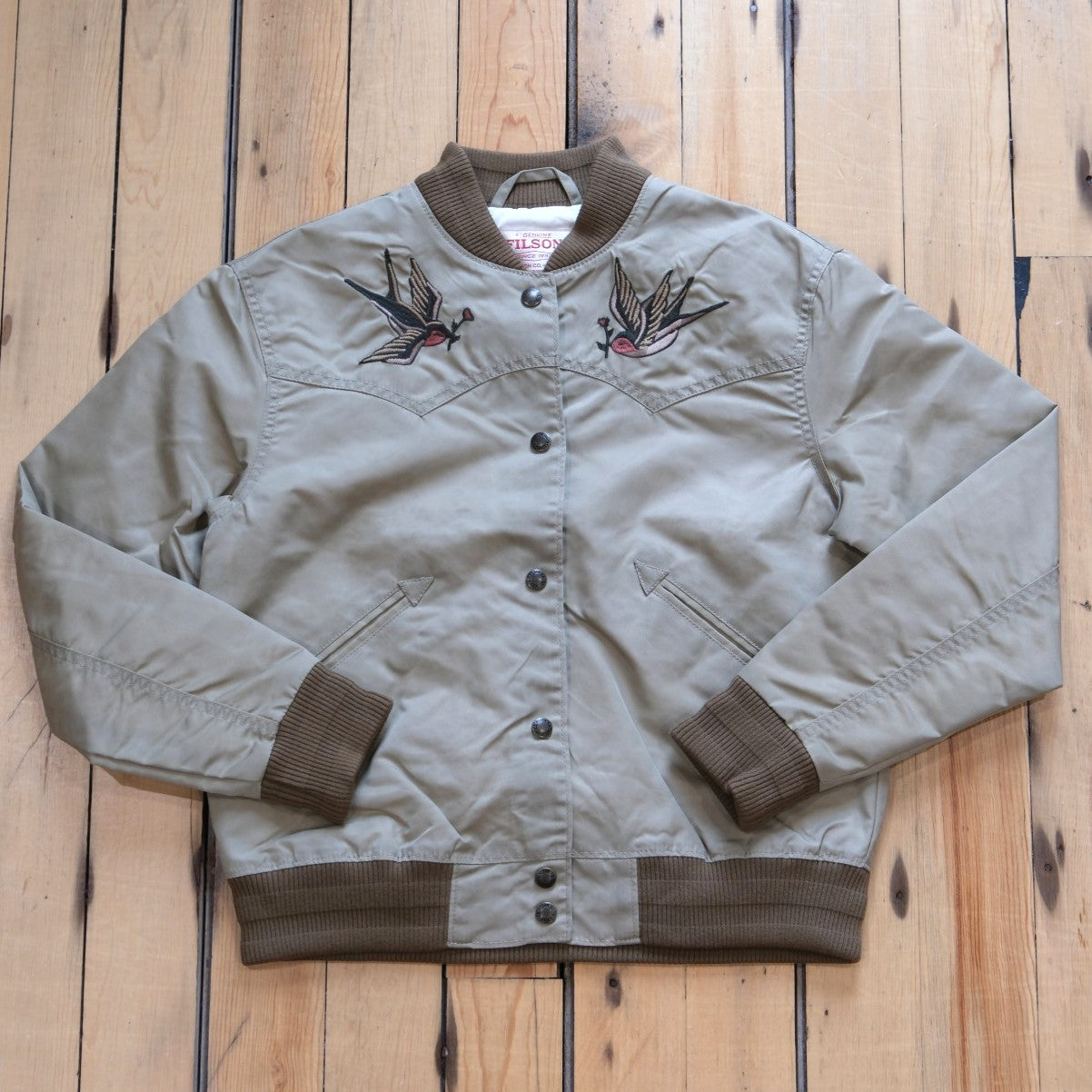 Filson Ladies Western Satin Jacket in Silver Sage featuring embroidered western yokes and a snap-front design.