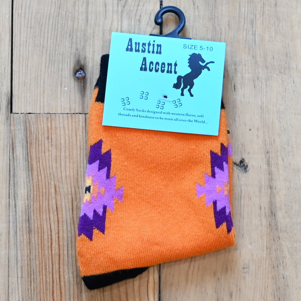 View of Kids Large Austin Accent Socks with orange color and purple colored western design.
